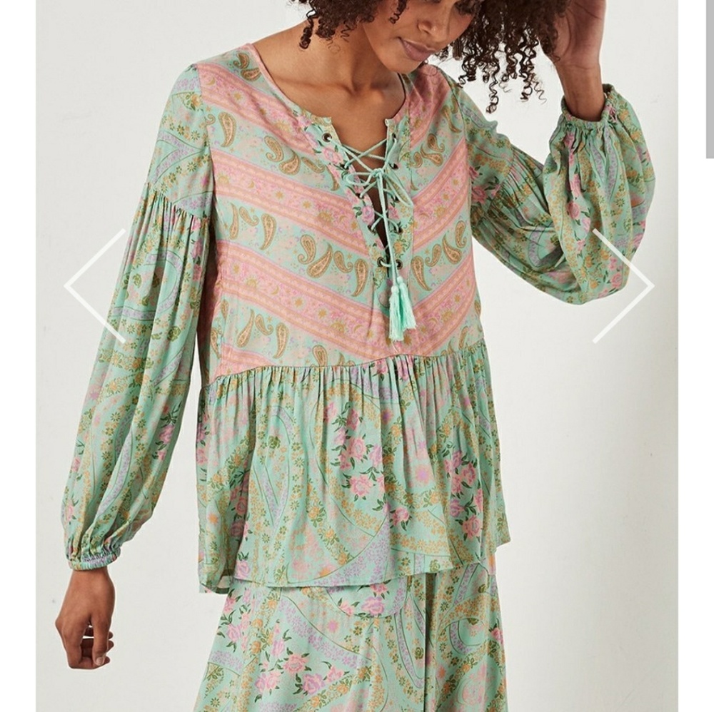 Spell sage top. Very soft +comfortable.  Worn once( I think)